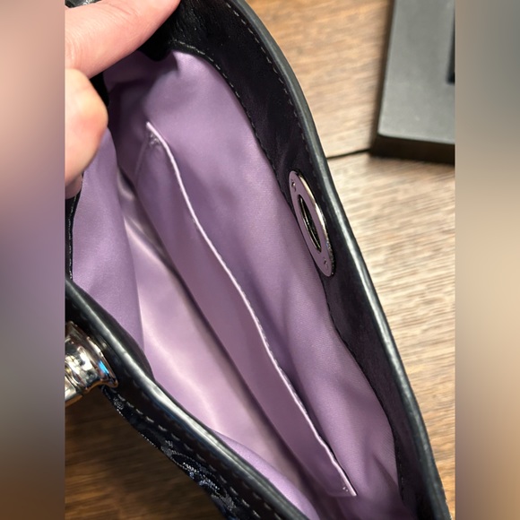 COACH wristlet with turn lock closure. Black and silver - Picture 8 of 9